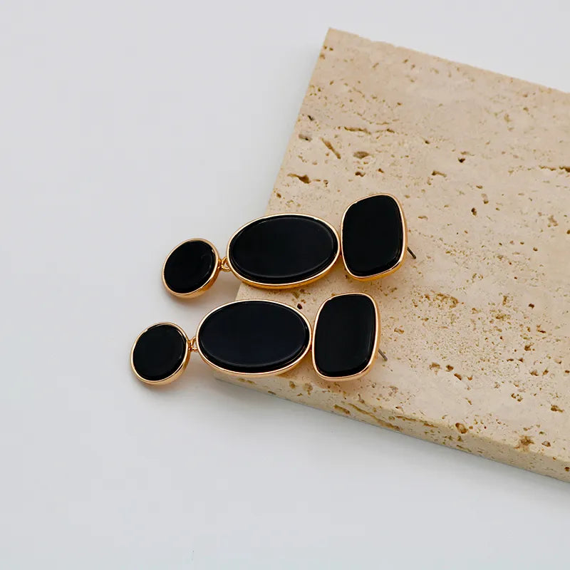 Brinco Preto Multi Forma