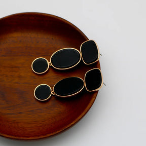 Brinco Preto Multi Forma