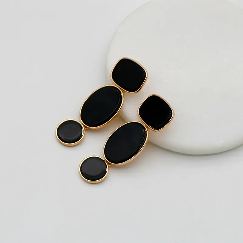 Brinco Preto Multi Forma