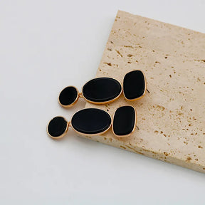 Brinco Preto Multi Forma