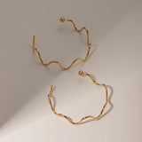 Brinco de Argola em Ondas